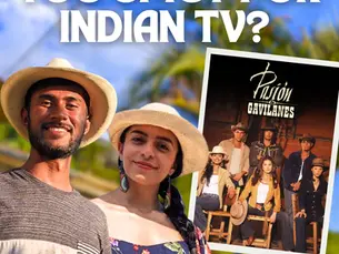 Aswin and Luisa with a poster of the novela Pasion de Gavilanes