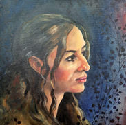 Portrait of a beautiful woman with leaves