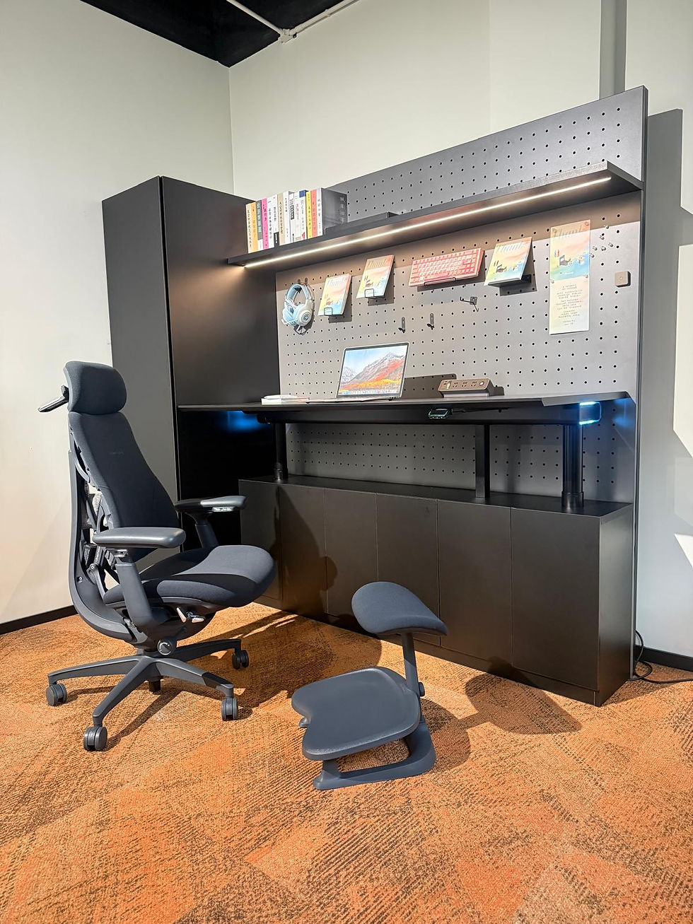 Eye-level view of a sleek ergonomic office chair in a bright workspace