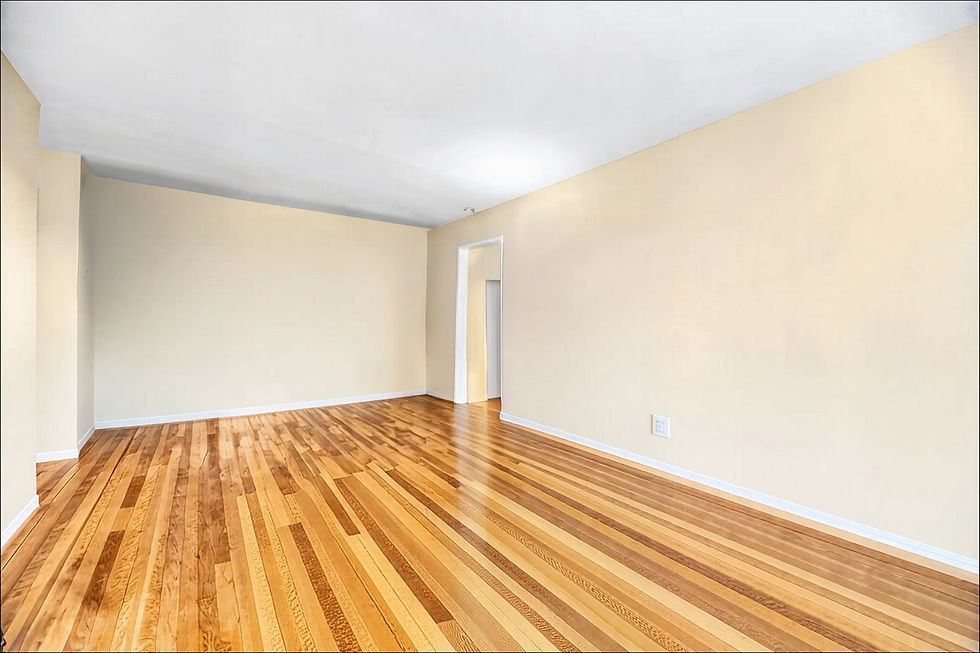 66-37_Yellowstone_Boulevard_4A_LivingRoom-Reverse_Empty
