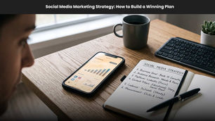 Desk with phone analytics, notebook titled Social Media Strategy, coffee mug and keyboard under banner Social Media Marketing Strategy