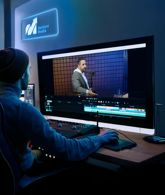Video editor at Venture Media editing a podcast episode for Blueprint for Closers in a professional studio setup.