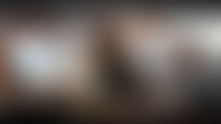 Two people podcasting with microphones, smiling in a modern studio with tech gear. Screen shows "YouTube Podcast Guide 2026".