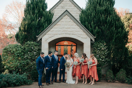 bridal party in front of church