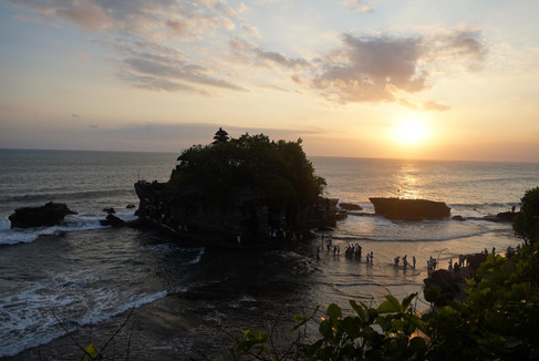 Tanah Lot at sunset from neighbouring cliff