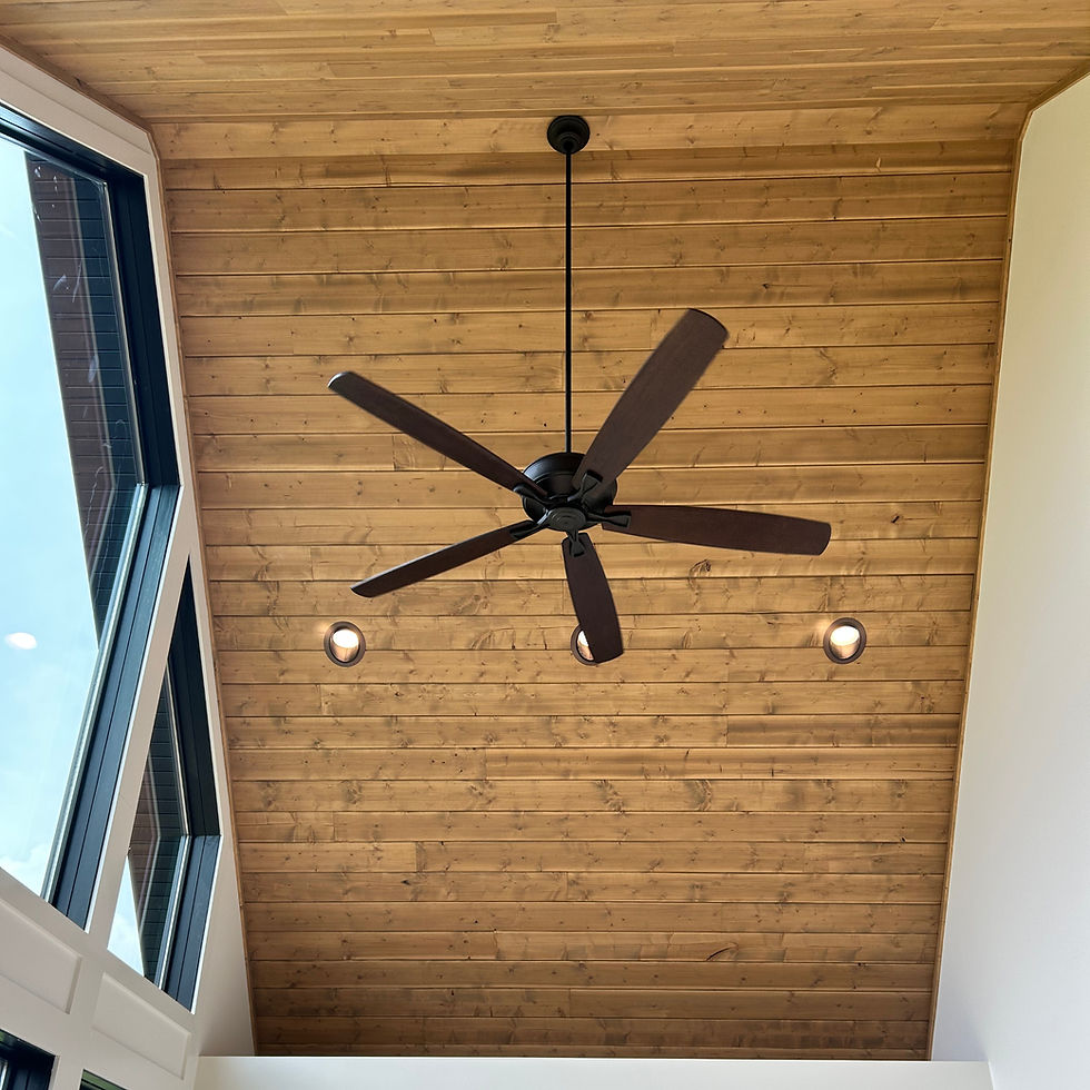 Ceiling fan in a room with vaulted ceiling