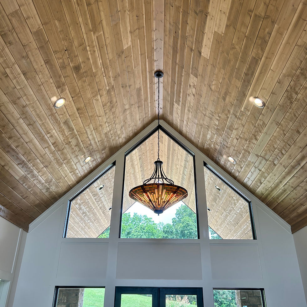 Modern vaulted wood ceiling lighting by Bradford Electric LLC