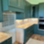 Kitchen under-cabinet lighting by Bradford Electric LLC.