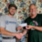 Bradford Electric LLC technician shaking hands with client