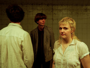 DOMINA: Between Shadows and Static