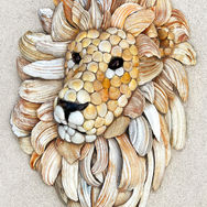 Lion sand and seashell art by Anna Chan
