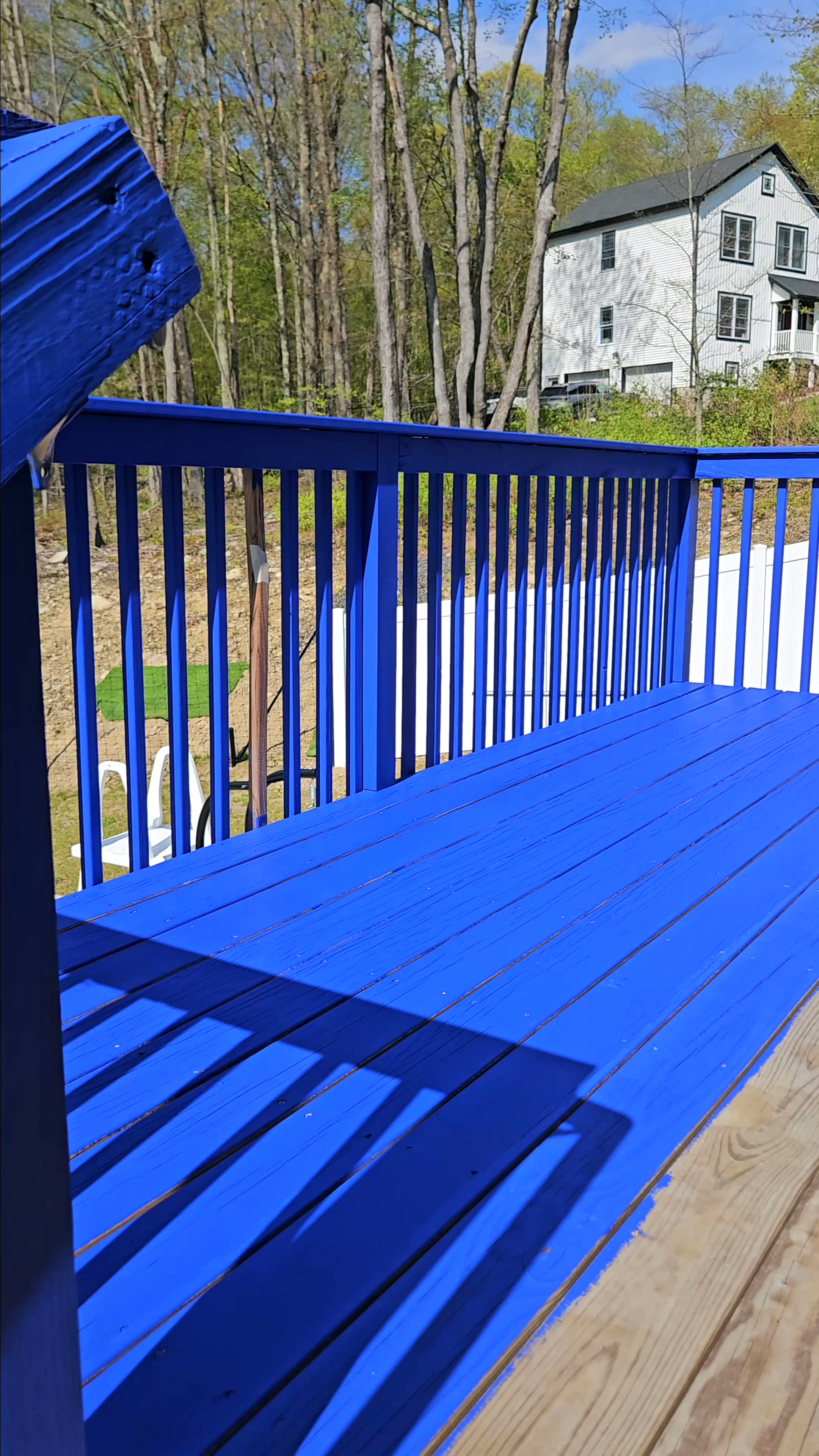 Lux Total Care working on a blue-finished deck