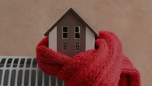 Energiecheck Nordhorn: Haus in Schal eingehüllt