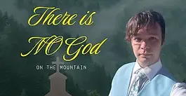 Corona wears a light blue suit against a foggy background.