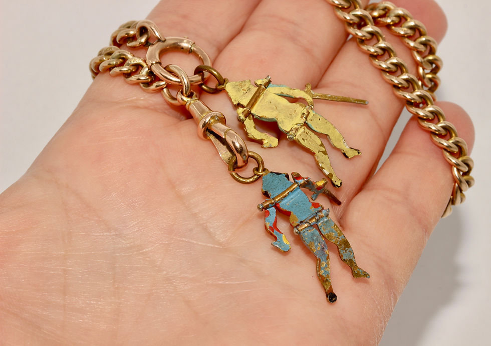 Thumbnail: A Pair Of French Antique 19th Century Enamel Gilt Metal Articulated Puppet Charm