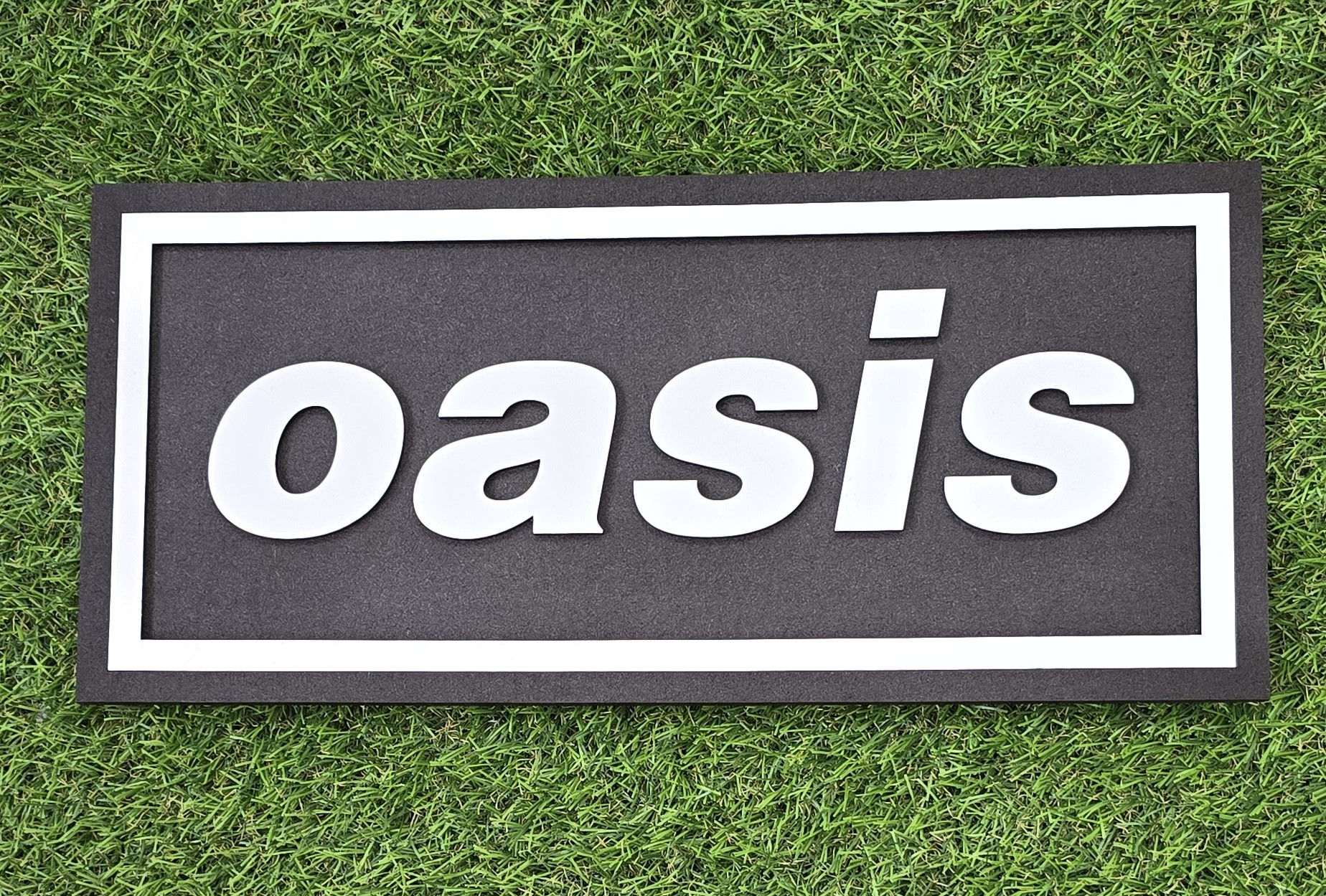 Oasis Wall Badge