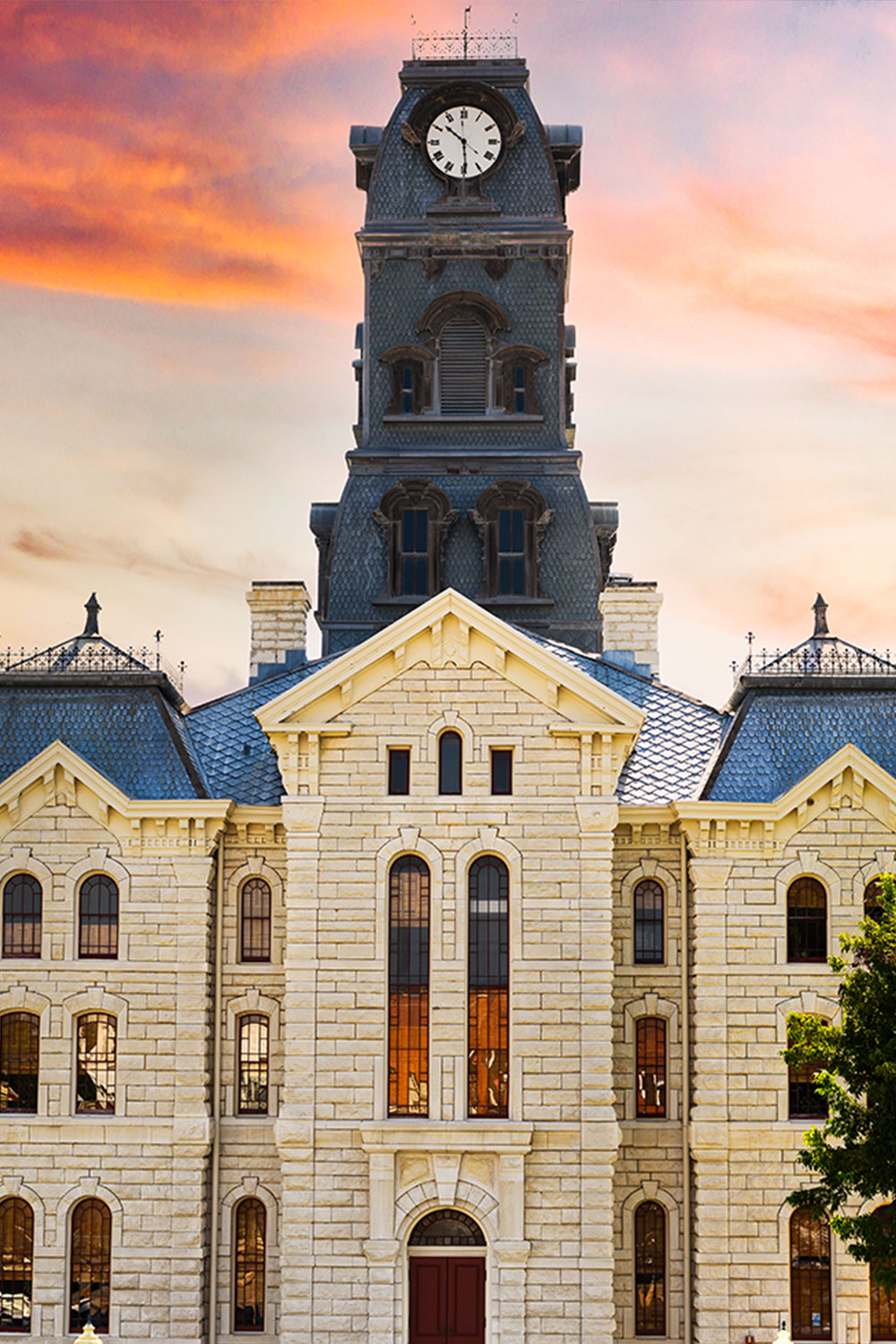 Historic Hood County Courthouse in Granbury, Texas, at twilight