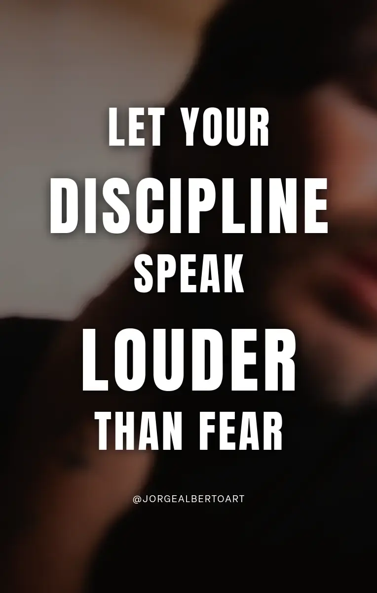 Inspirational quote graphic reading ‘Let your discipline speak louder than fear’ by Jorge Alberto, displayed over a blurred portrait-style background.