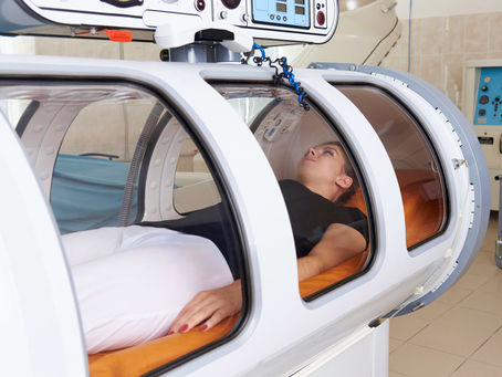 woman in hyperbaric oxygen therapy chamber Red Deer