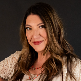 Kuvy Ax headshot April 2023 (2).png