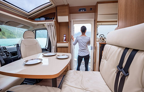 Woman in the interior of a camper RV mot