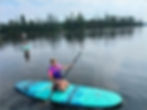 Girl paddle boarding_edited.jpg