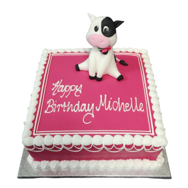 Bespoke cartoon cow cake with black and white spots, pink snout, and green grass base in Solihull, West Midlands.