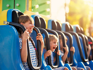 Kids on a theme park ride