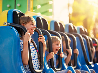 Kids on a theme park ride