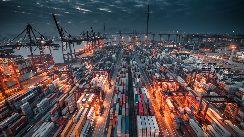 Aerial view of busy container shipping port terminal at dusk during global supply chain disruption 2026