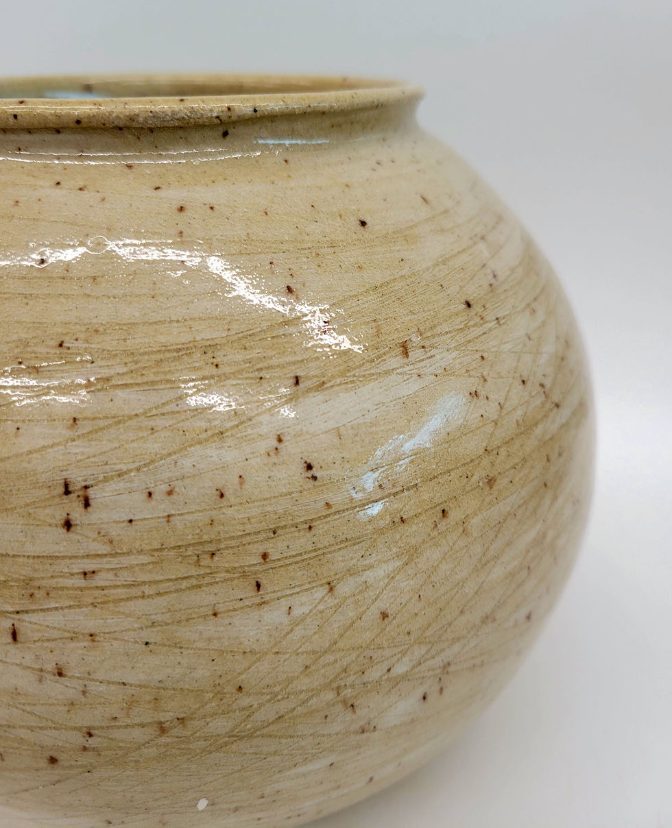 Thumbnail: A jar with a lid, featuring hand-drawn abstract linework.