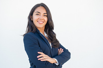 smiling-confident-businesswoman-posing-with-arms-folded.jpeg