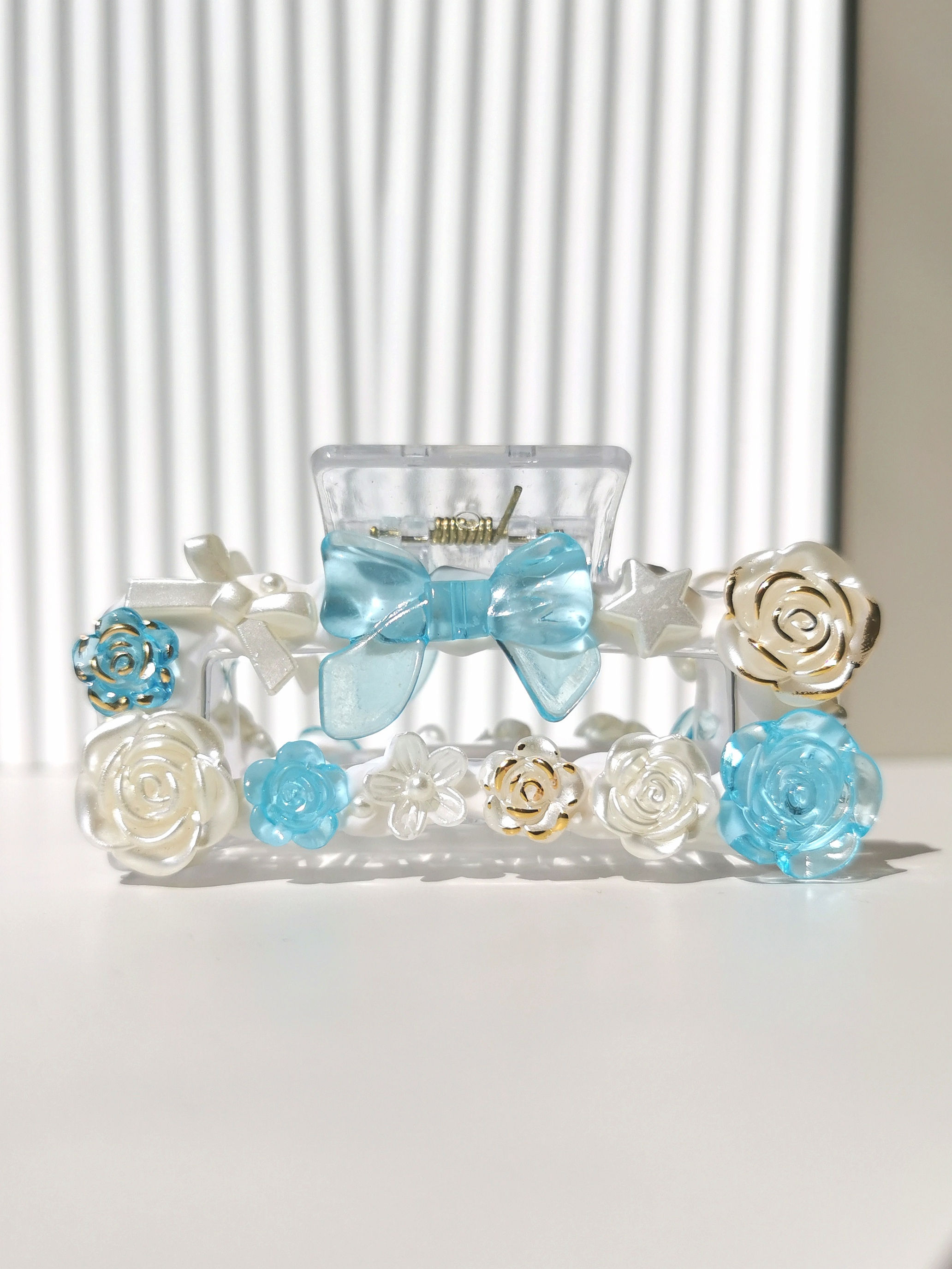 Frosted Blue Floral bloom hair claw accessory decorated with imitation cream glue front view