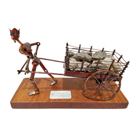 Pedras no caminho Guardo todas um dia vou construir um castelo Nemo Nox decoração escultura arte em metal carroça