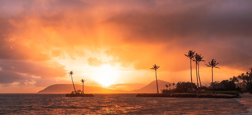 Sunset over tropical volcanic islands