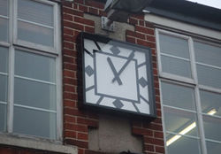 Art Deco clock in square bezel