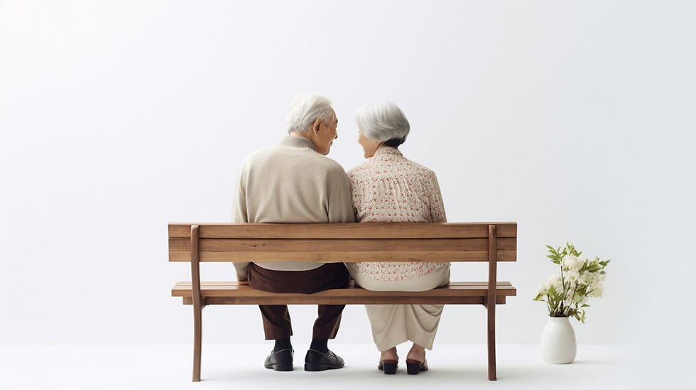 ベンチで談笑する老夫婦