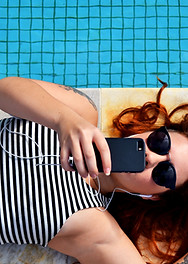 Girl Laying by Pool