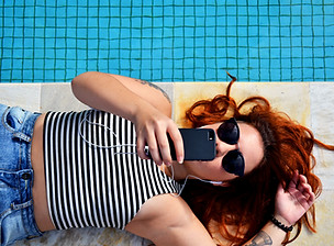 Girl Laying by Pool