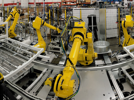 Robotic Assembly Cell for Automotive Cladding