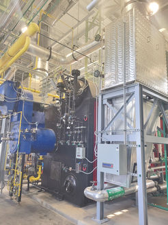 2700 horsepower high-pressure steam boiler installation at Tomah VA Medical Center, with Roberts HVAC crew staging large boiler units and high-pressure piping systems.
