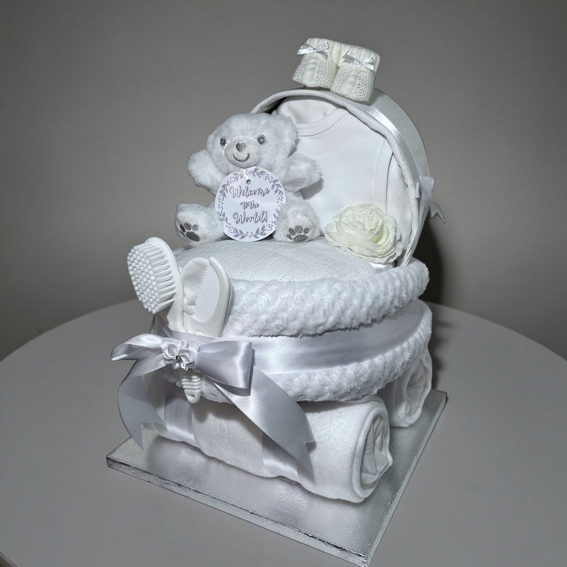 Neutral White baby nappy cake pram gift with coordinated essentials