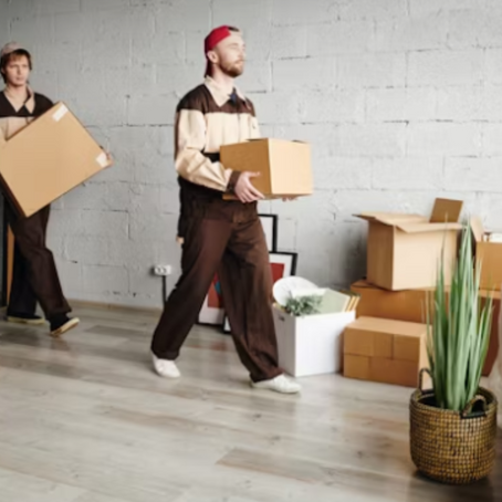 A Co-Tasker moving team helping a family settle into their new Dortmund home. Find professional movers who make your transition stress-free!