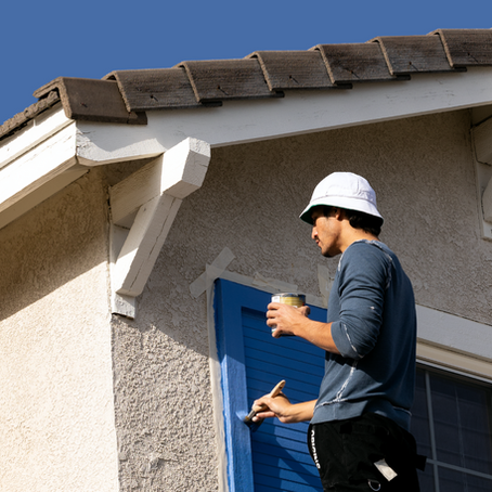 A tasker helping a local client painting a modern Frankfurt apartment.