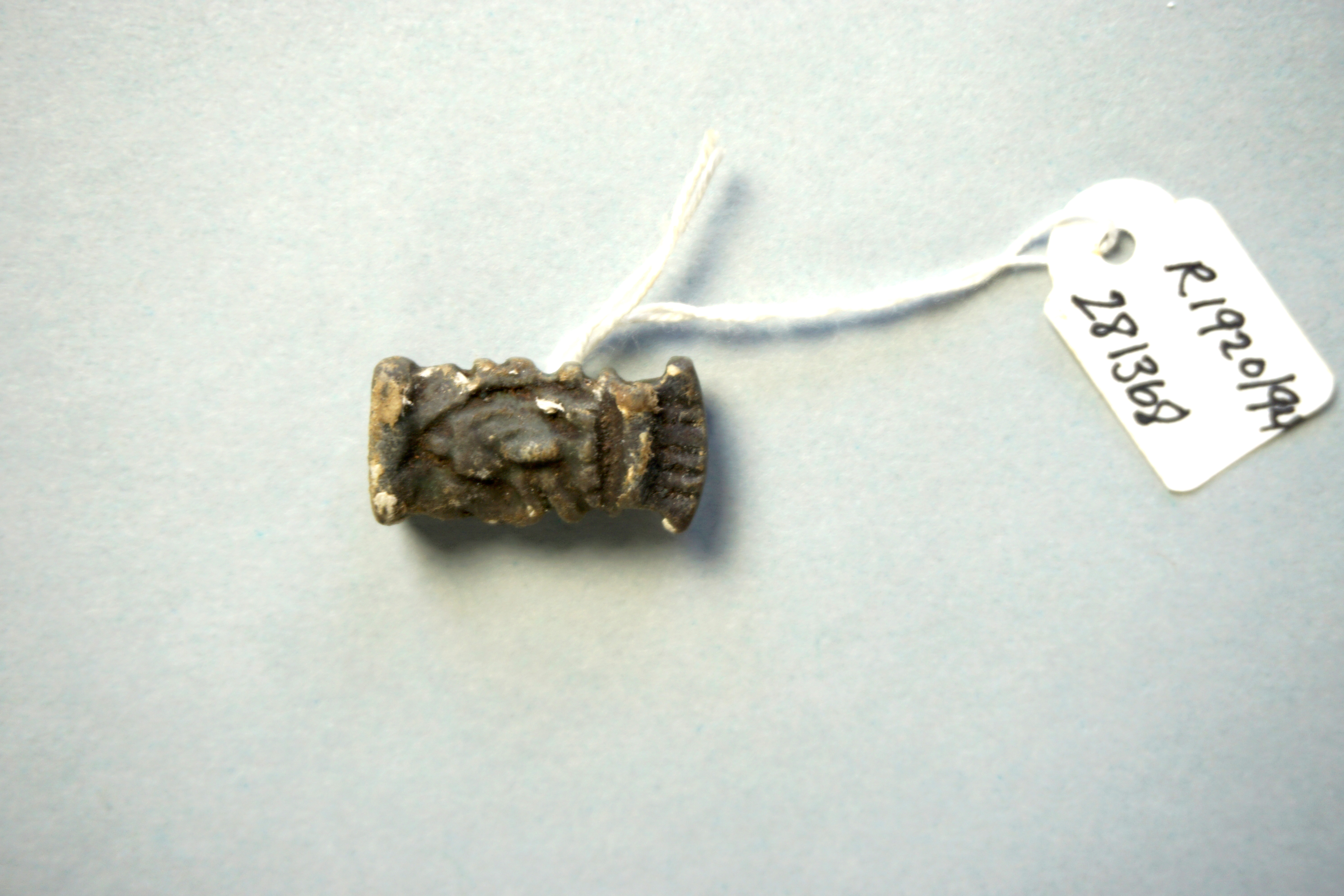 Egyptian amulet with tags