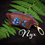 Thumbnail: "Nyx" bag: dark brown cork waste bag dispenser with full and crescent moon openwork showing a blue floral fabric