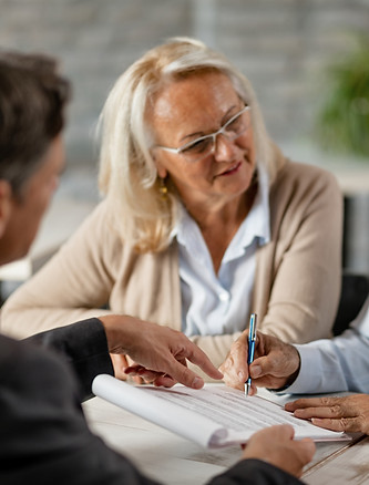 mature-couple-having-meeting-with-bank-m