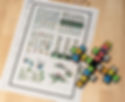 Magnetic cube puzzle pieces and instruction sheet showing geometric designs and building challenges.