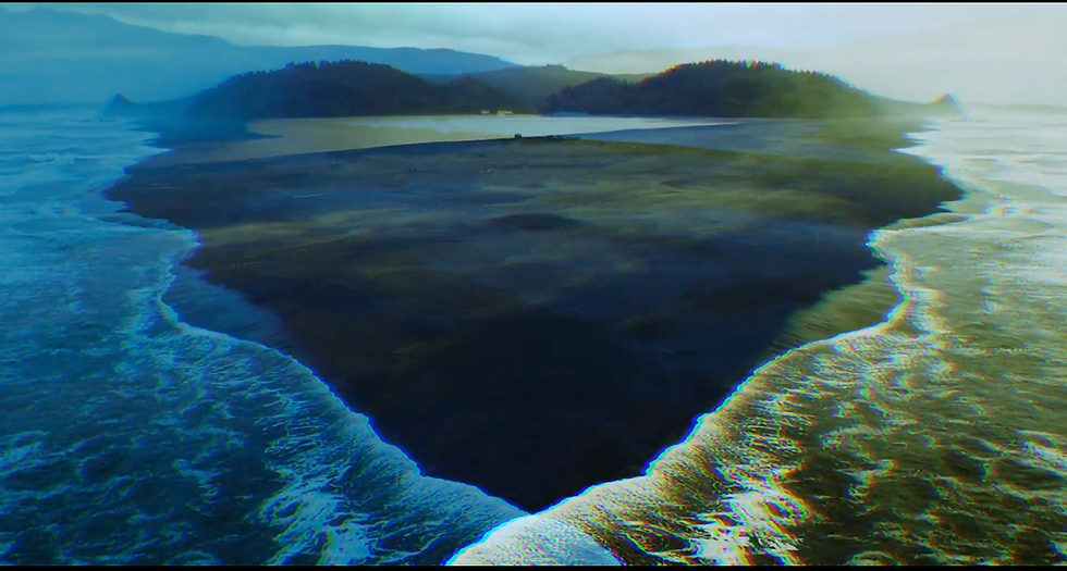 mirrored visual effect of ocean waves on a beach