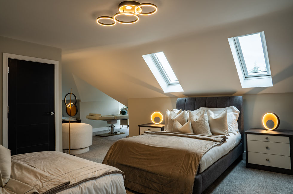 Modern bedroom with skylights and elegant lighting fixtures.